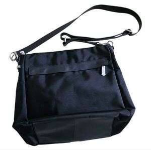 Travelpro Women's Black Leather and Nylon Handbag.